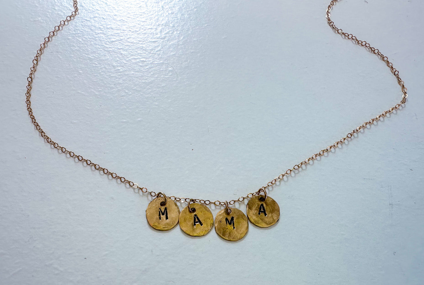 M.A.M.A. coin necklace